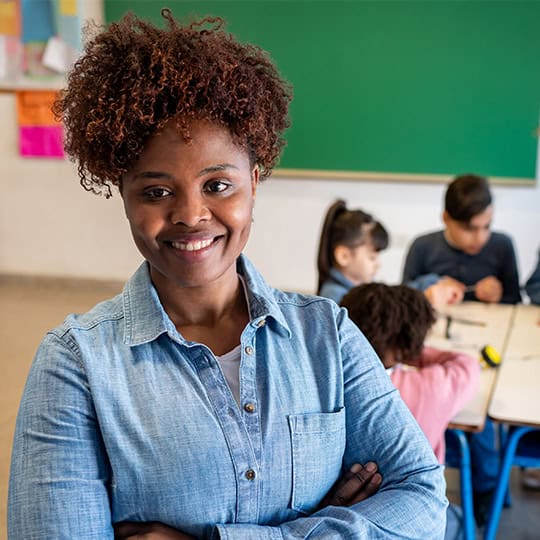 Teacher in classroom proud of students 2025 onpoint prize